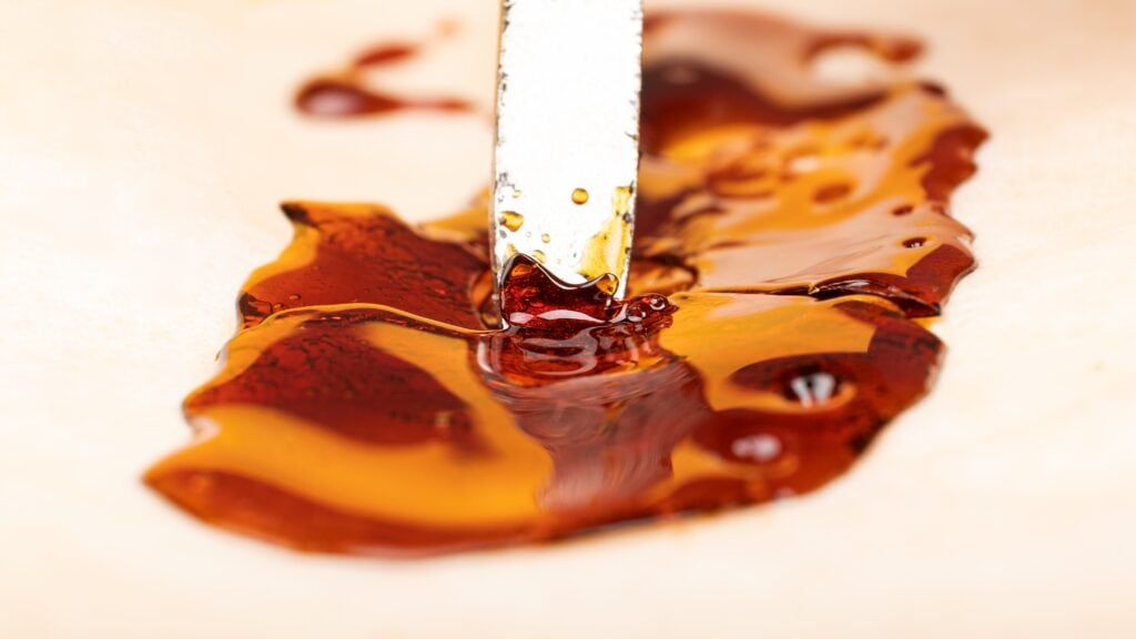 cannabis concentrate, small portion being scraped off